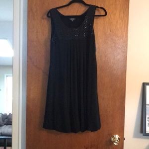 Black sleeveless above the knee mini dress